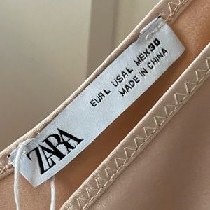 Rose color camisole.